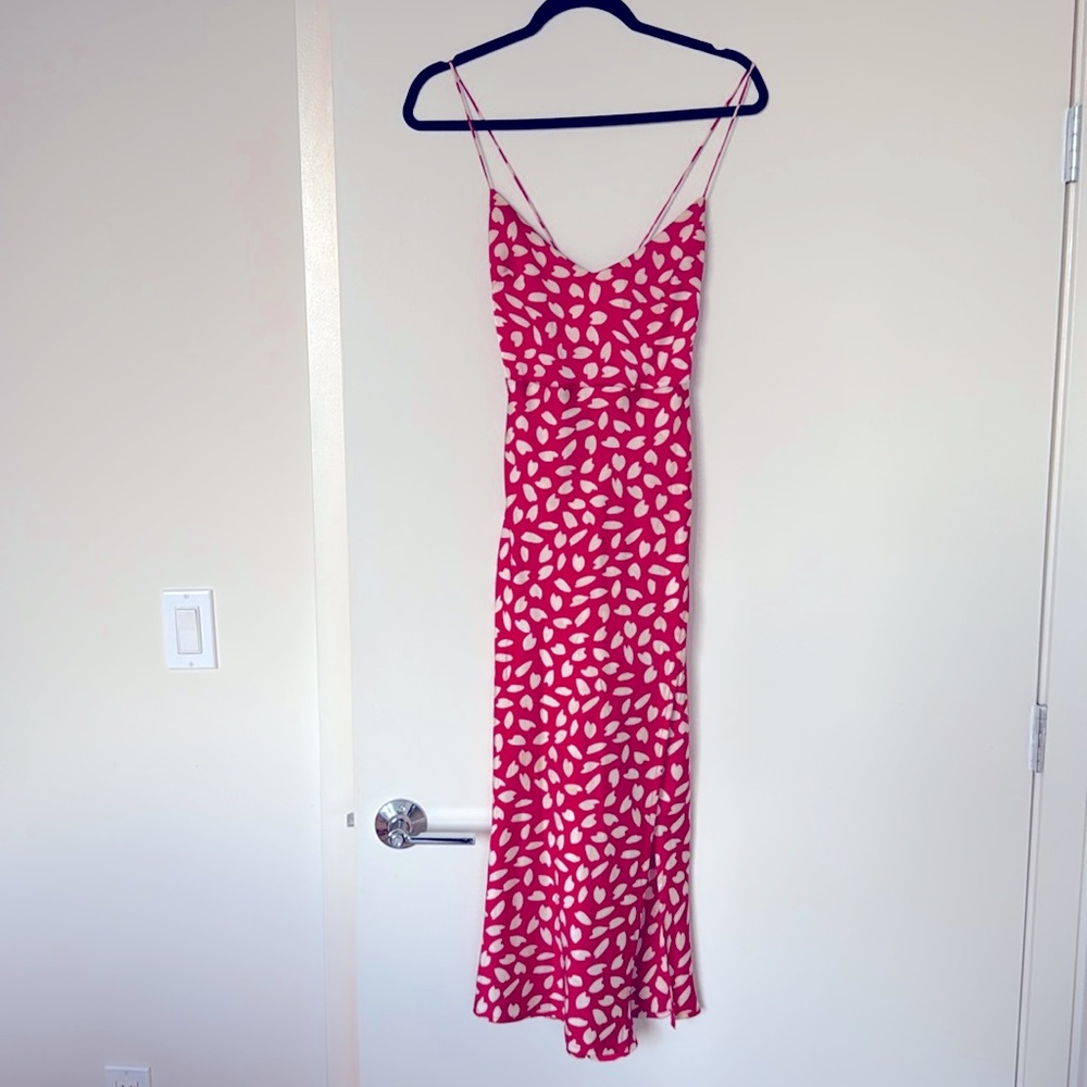 Red and white satin slip dress with a slit